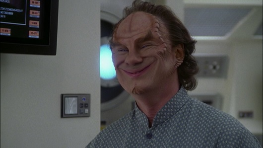 Doctor Phlox giving his very, very wide smile.