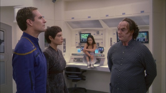 Phlox speaks with T'Pol and Archer about Hoshi, who sits nearby unseen