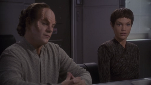 T'Pol and Phlox practice their poker faces in front of the Vulcan scientists